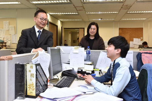 Picture 3 shows the Secretary for the Civil Service, Mr Clement Cheung (left) is briefed by staff of the Crime Section of the Litigation Division on the processing of criminal legal aid applications and handling of criminal litigation at all court levels.